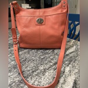 Coach Penelope coral pebbled leather crossbody bag .